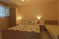 Łóżko lub łóżka w pokoju w obiekcie Apartment Silo 35
