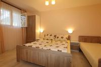 Łóżko lub łóżka w pokoju w obiekcie Apartment Silo 35