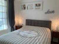 Cama o camas de una habitaci&oacute;n en Villa Magaly T4 &agrave; 50 m de la plage de Valras centre