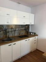 Kuchnia lub aneks kuchenny w obiekcie Apartament i pokoje Szalawa