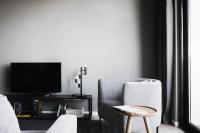 A television and/or entertainment centre at Dreams Hotel Città Studi