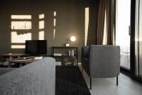 A television and/or entertainment centre at Dreams Hotel Città Studi