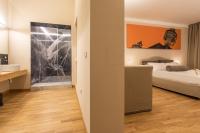 Posteľ alebo postele v izbe v ubytovaní Divisi Suites & SPA