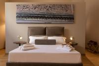 Posteľ alebo postele v izbe v ubytovaní Divisi Suites & SPA