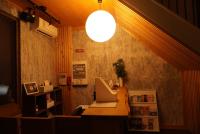 Muji House Osaka Sannan Hotel 大阪泉南酒店良築 にあるテレビまたはエンターテインメントセンター