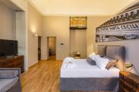 Posteľ alebo postele v izbe v ubytovaní Divisi Suites & SPA