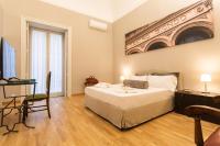 Posteľ alebo postele v izbe v ubytovaní Divisi Suites & SPA