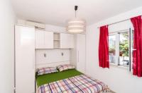 Posteľ alebo postele v izbe v ubytovaní Apartments Ammos