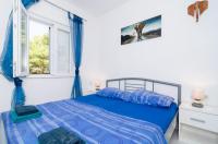 Posteľ alebo postele v izbe v ubytovaní Apartments Ammos