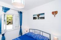 Posteľ alebo postele v izbe v ubytovaní Apartments Ammos