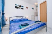 Posteľ alebo postele v izbe v ubytovaní Apartments Ammos
