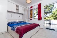 Posteľ alebo postele v izbe v ubytovaní Apartments Ammos