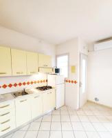 A kitchen or kitchenette at Residence Stella Polare