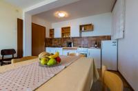 Kuchyňa alebo kuchynka v ubytovaní Bela Apartments
