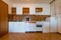 Kuchyňa alebo kuchynka v ubytovaní Bela Apartments