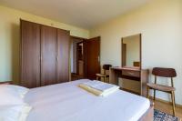 Posteľ alebo postele v izbe v ubytovaní Bela Apartments