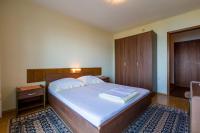 Posteľ alebo postele v izbe v ubytovaní Bela Apartments