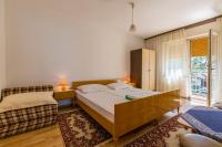 Posteľ alebo postele v izbe v ubytovaní Bela Apartments