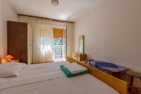 Posteľ alebo postele v izbe v ubytovaní Bela Apartments