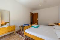 Posteľ alebo postele v izbe v ubytovaní Bela Apartments