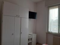 Televízia a/alebo spoločenská miestnosť v ubytovaní Gardenia Guest House
