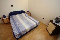 Posteľ alebo postele v izbe v ubytovaní Apartments in Novi Vinodolski 39371