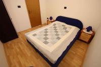 Posteľ alebo postele v izbe v ubytovaní Apartments in Novi Vinodolski 39371