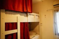 Postel nebo postele na pokoji v ubytování El Camino Hostel & Pub