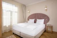 Grand Hotel Union Eurostarsにあるベッド