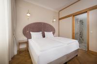 Grand Hotel Union Eurostarsにあるベッド