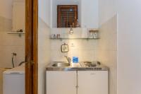 Kuchyňa alebo kuchynka v ubytovaní Sunny Apartments Mara