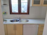 Kuchyňa alebo kuchynka v ubytovaní Sunny Apartments Mara