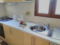 Kuchyňa alebo kuchynka v ubytovaní Sunny Apartments Mara