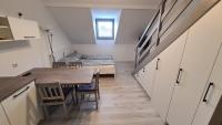 Kuchyňa alebo kuchynka v ubytovaní Gyulai-fürdő-apartman II.