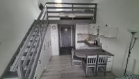 Kuchyňa alebo kuchynka v ubytovaní Gyulai-fürdő-apartman II.