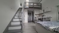 Posteľ alebo postele v izbe v ubytovaní Gyulai-fürdő-apartman II.