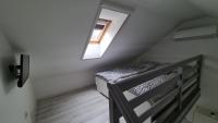 Posteľ alebo postele v izbe v ubytovaní Gyulai-fürdő-apartman II.