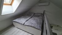 Posteľ alebo postele v izbe v ubytovaní Gyulai-fürdő-apartman II.
