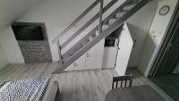 Kuchyňa alebo kuchynka v ubytovaní Gyulai-fürdő-apartman II.