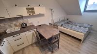 Kuchyňa alebo kuchynka v ubytovaní Gyulai-fürdő-apartman II.