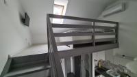 Posteľ alebo postele v izbe v ubytovaní Gyulai-fürdő-apartman II.