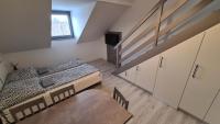 Posteľ alebo postele v izbe v ubytovaní Gyulai-fürdő-apartman II.
