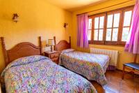 Postel nebo postele na pokoji v ubytování EVA & TRAVEL - El Bosquet de Prades