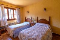 Postel nebo postele na pokoji v ubytování EVA & TRAVEL - El Bosquet de Prades