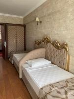 Postel nebo postele na pokoji v ubytování LAUR HOTELS Experience & Elegance
