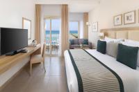 TV a/nebo společenská místnost v ubytování JAZ Elite Casa Del Mar Beach