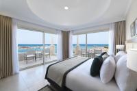 Postel nebo postele na pokoji v ubytování JAZ Elite Casa Del Mar Beach
