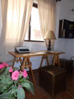 TV a/nebo společenská místnost v ubytování Emmanuel Apartments