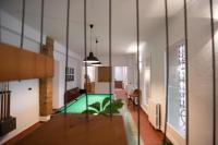 Postel nebo postele na pokoji v ubytování VILLA DEL RIU