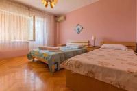 Posteľ alebo postele v izbe v ubytovaní Three-Bedroom Apartment in Crikvenica XII